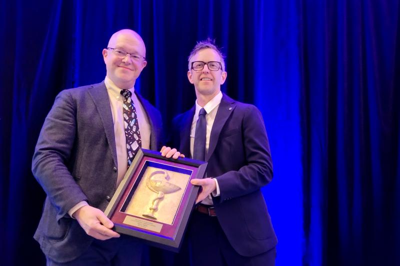 Jason Steeves being presented with the Bowl of Hygeia